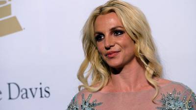 Britney Spears shows off swollen ankle after paramedics called to her hotel