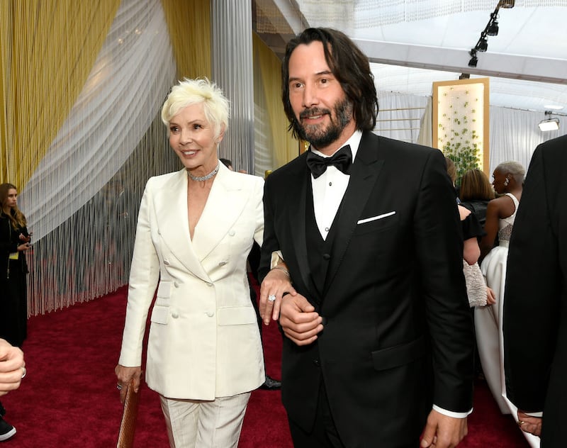 HOLLYWOOD, CALIFORNIA - FEBRUARY 09: Patricia Taylor and Keanu Reeves attend the 92nd Annual Academy Awards at Hollywood and Highland on February 09, 2020 in Hollywood, California. (Photo by Kevork Djansezian/Getty Images)