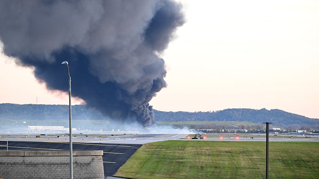 Smoke billows from plane crash